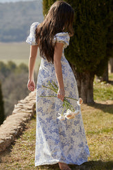 Vestido largo de verano con estampado floral, mangas abullonadas y cuello anudado - Azul